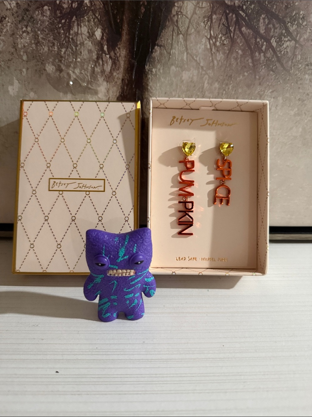 Betsy Johnson earrings and FUGGLER